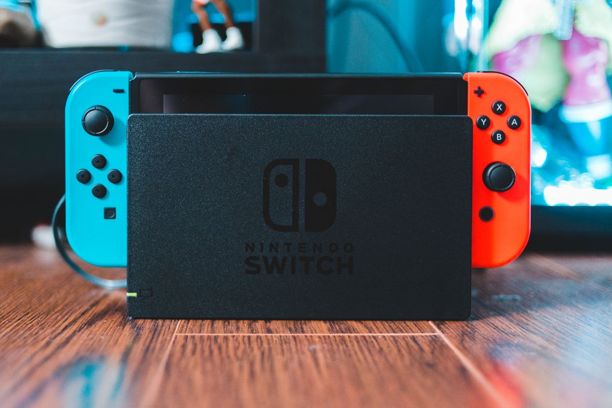 Game controller held in both hands during play